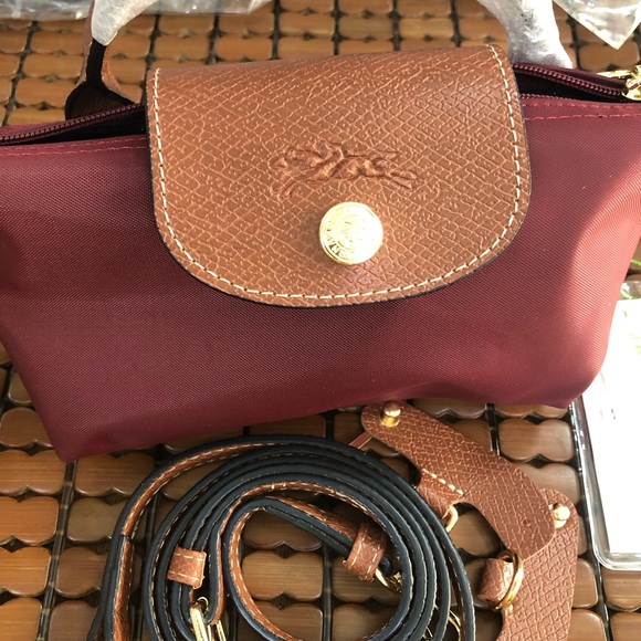 Longchamp Handbags - Longchamp Burgundy Crossbody with Brown Leather Flap and Gold Button